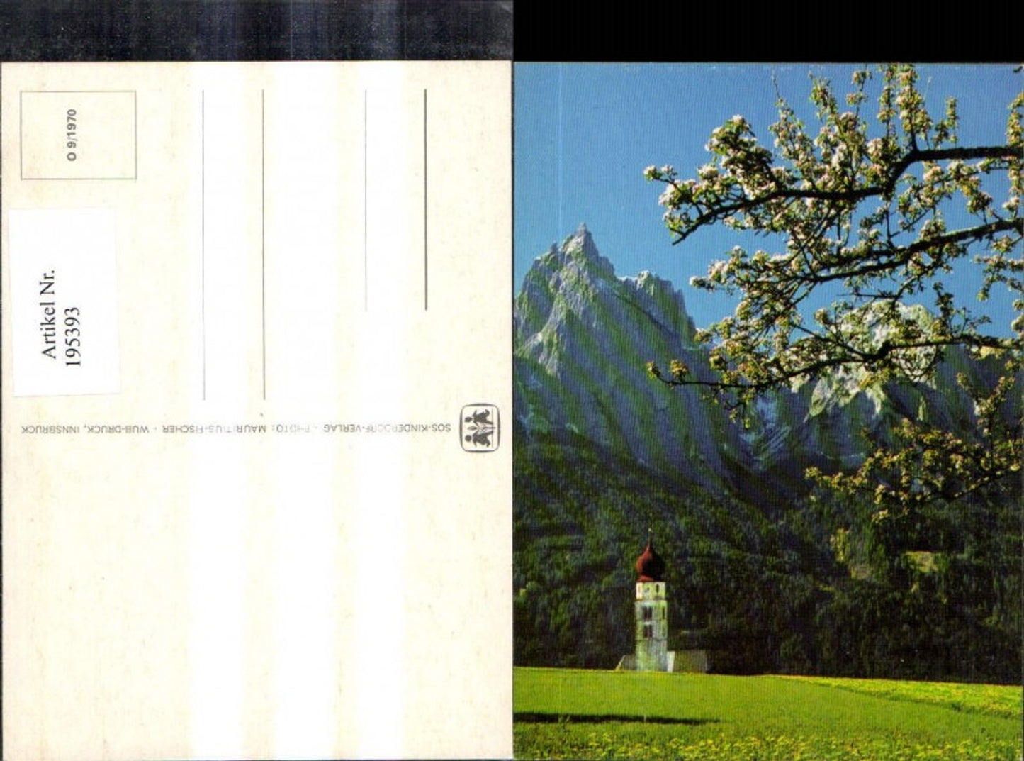 195393, SOS Children's Village O 9/1970 Church against mountain backdrop, blossoming trees in the foreground