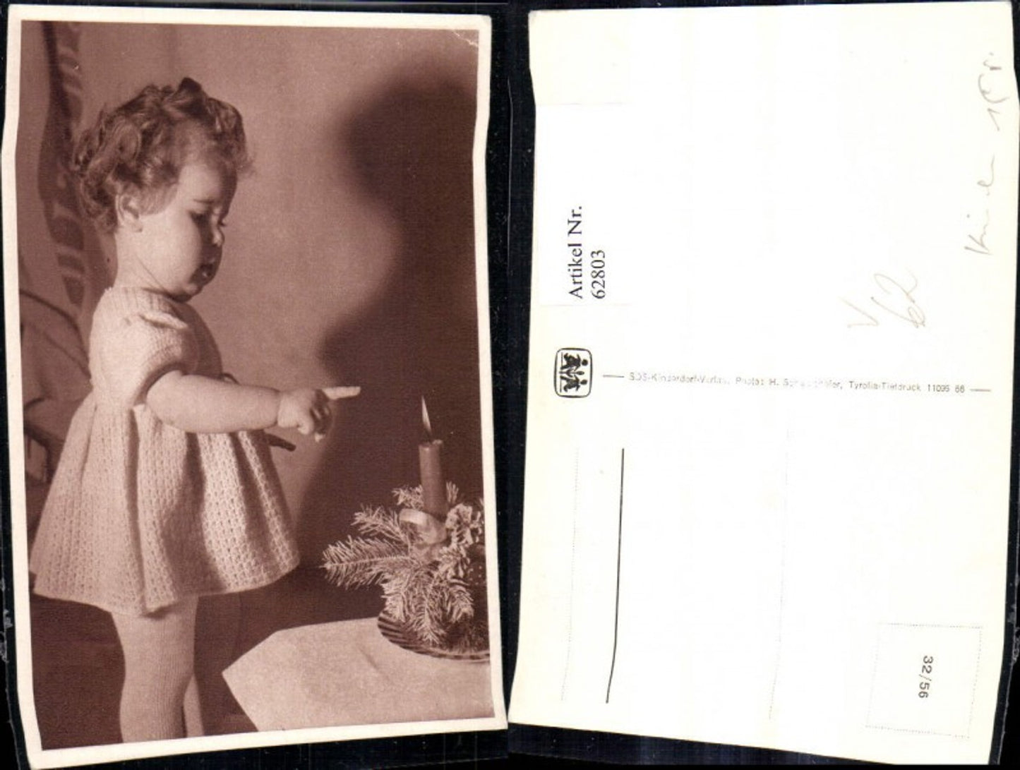62803, SOS Children's Village 32/56 Child girl with finger to burning candle