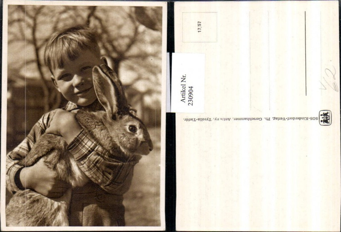230904, SOS Children's Village 17/57 Boy with rabbit