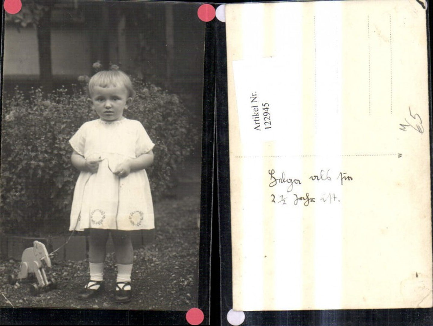 122945,Foto Ak Kind Mädchen m. Spielzeug Nachziehtier Nachziehelefant