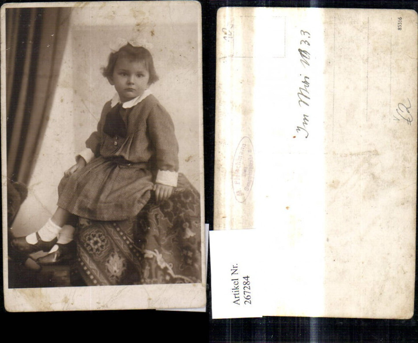 267284,Foto Ak Kind Mädchen i. Kleid Haarschleife 1933 pub M. Fleischmann Linz