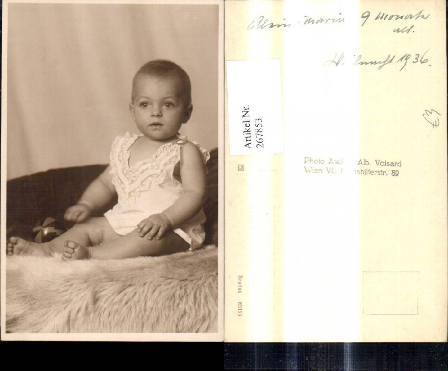 267853,foto Ak Kind Kleinkind m. Spielzeug Spielball Ball a. Fell sitzend