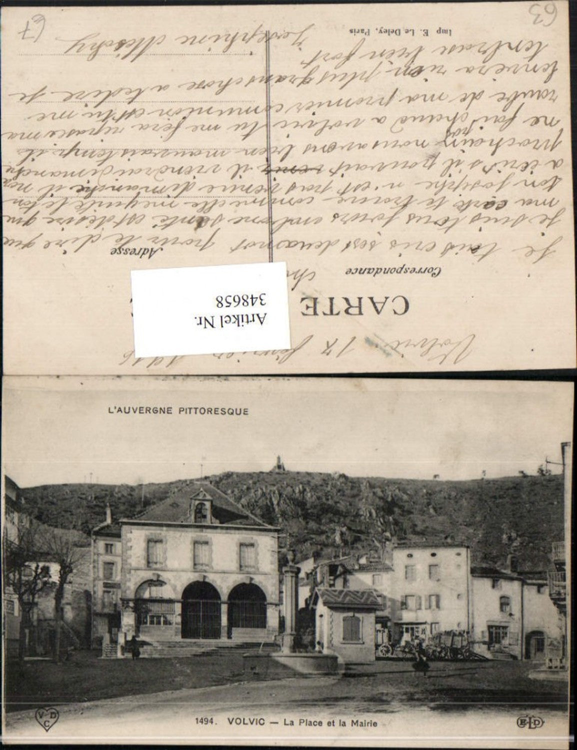 348658,Auvergne Puy-de-Dome Volvic La Polace et la Mairie Town hall fountain