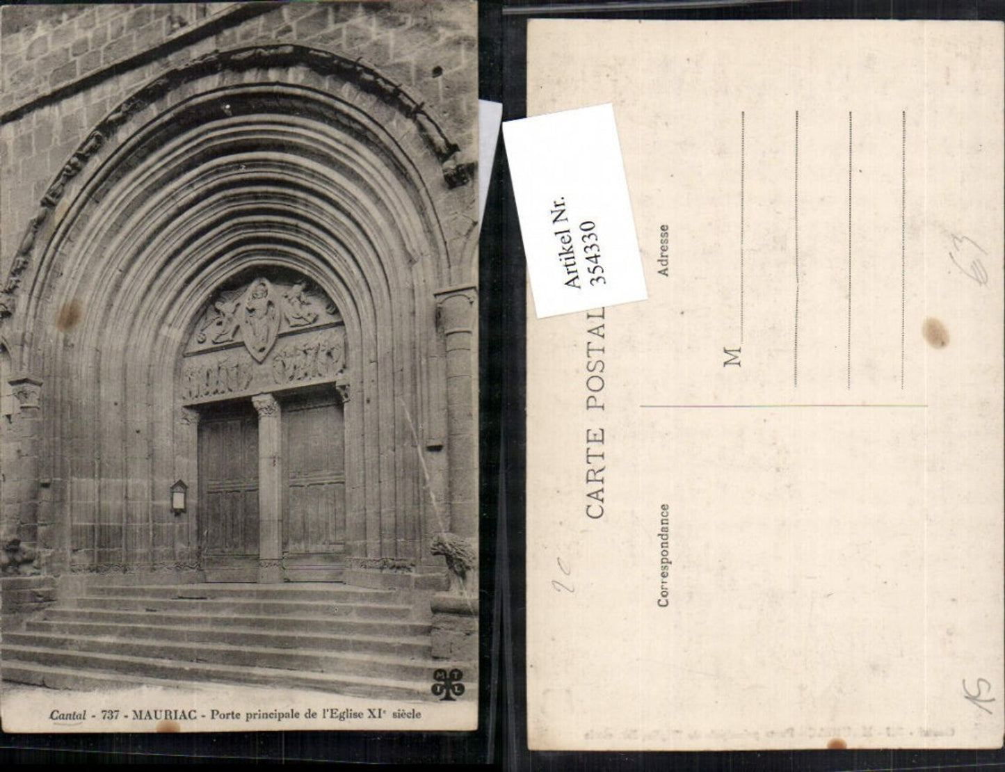 354330,Auvergne Cantal Mauriac Porte principale de l'Eglise Kirchenportal