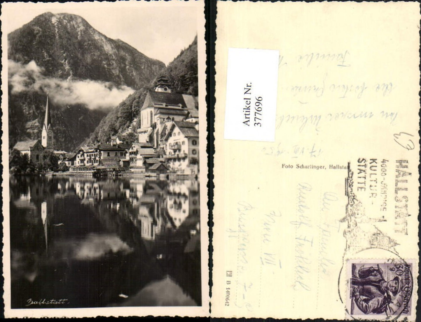 377696,Hallstatt Teilansicht Kirche Bergkulisse