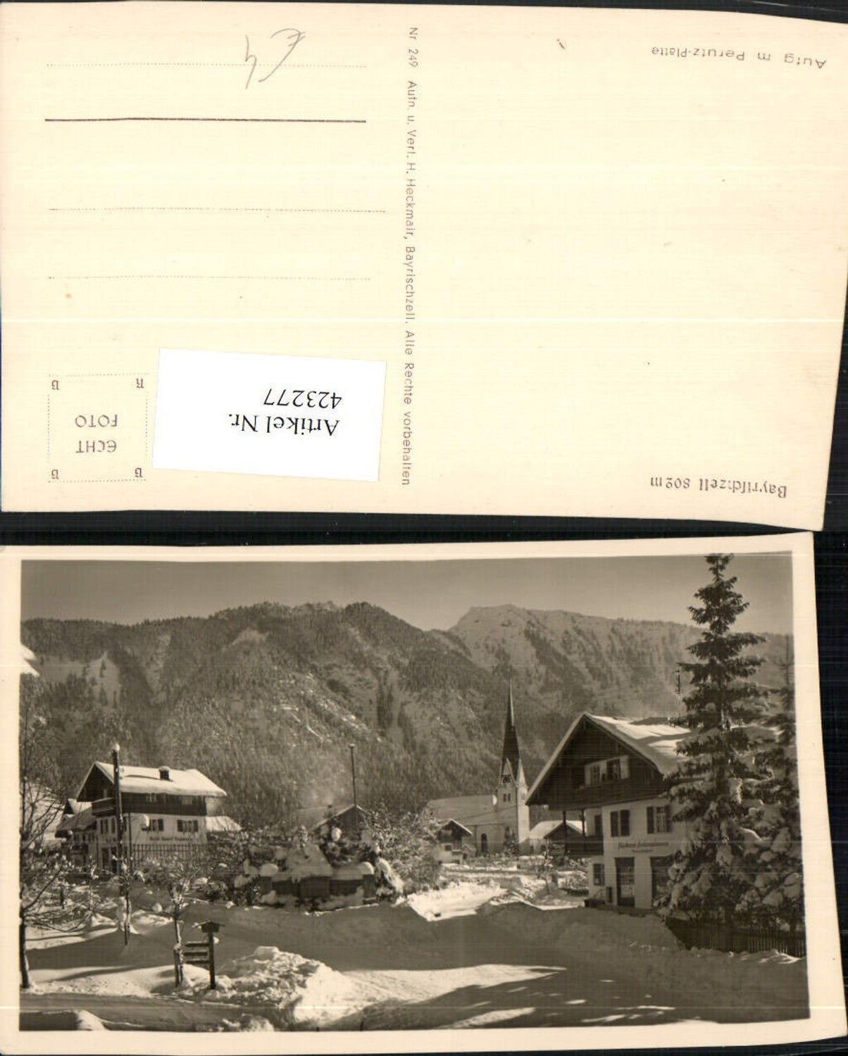 423277,Bayrischzell Teilansicht Kirche Bergkulisse Winterbild