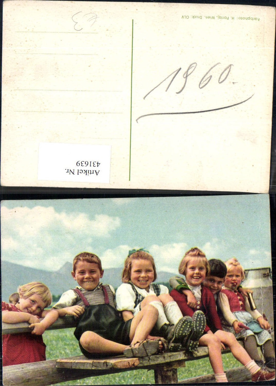 431639, Children sitting on a wooden bench