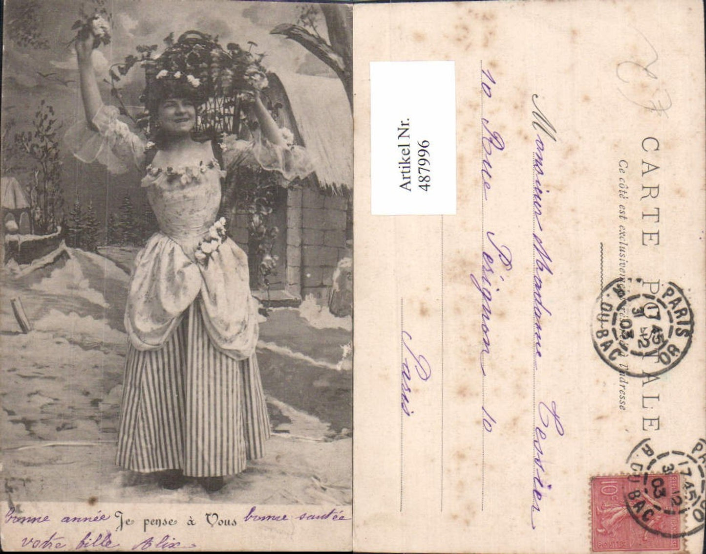 487996,Frau Tracht Rückenkorb m. Blumen Je pense a Vous