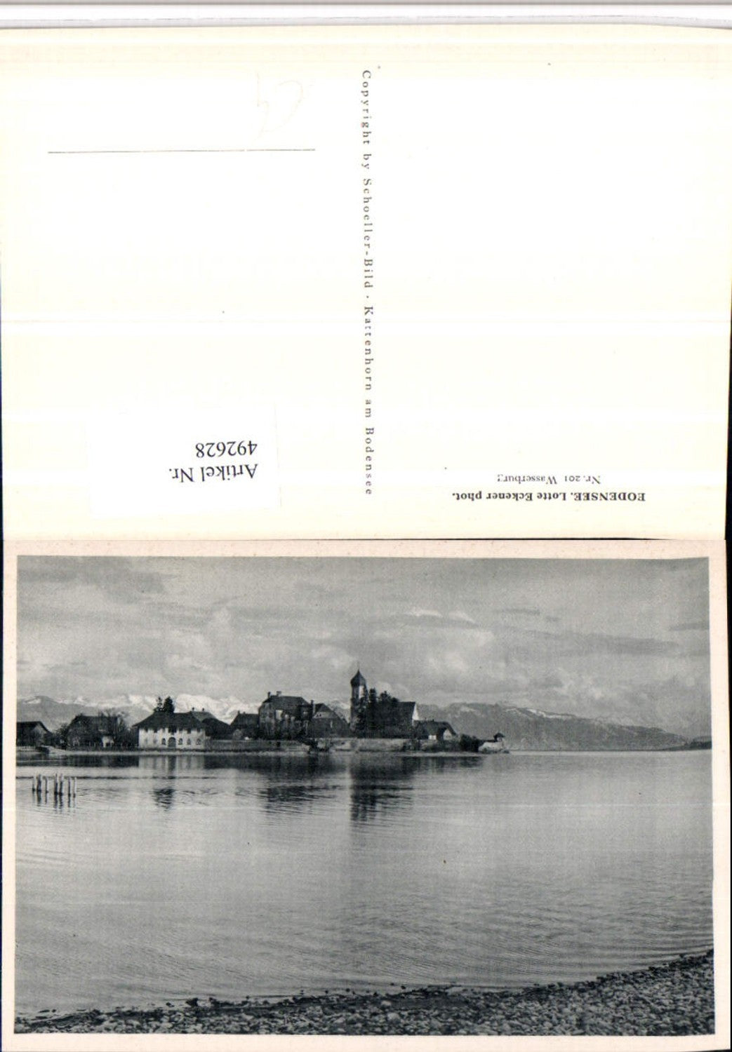 492628,Bodensee Wasserburg Teilansicht Kirche Bergkulisse