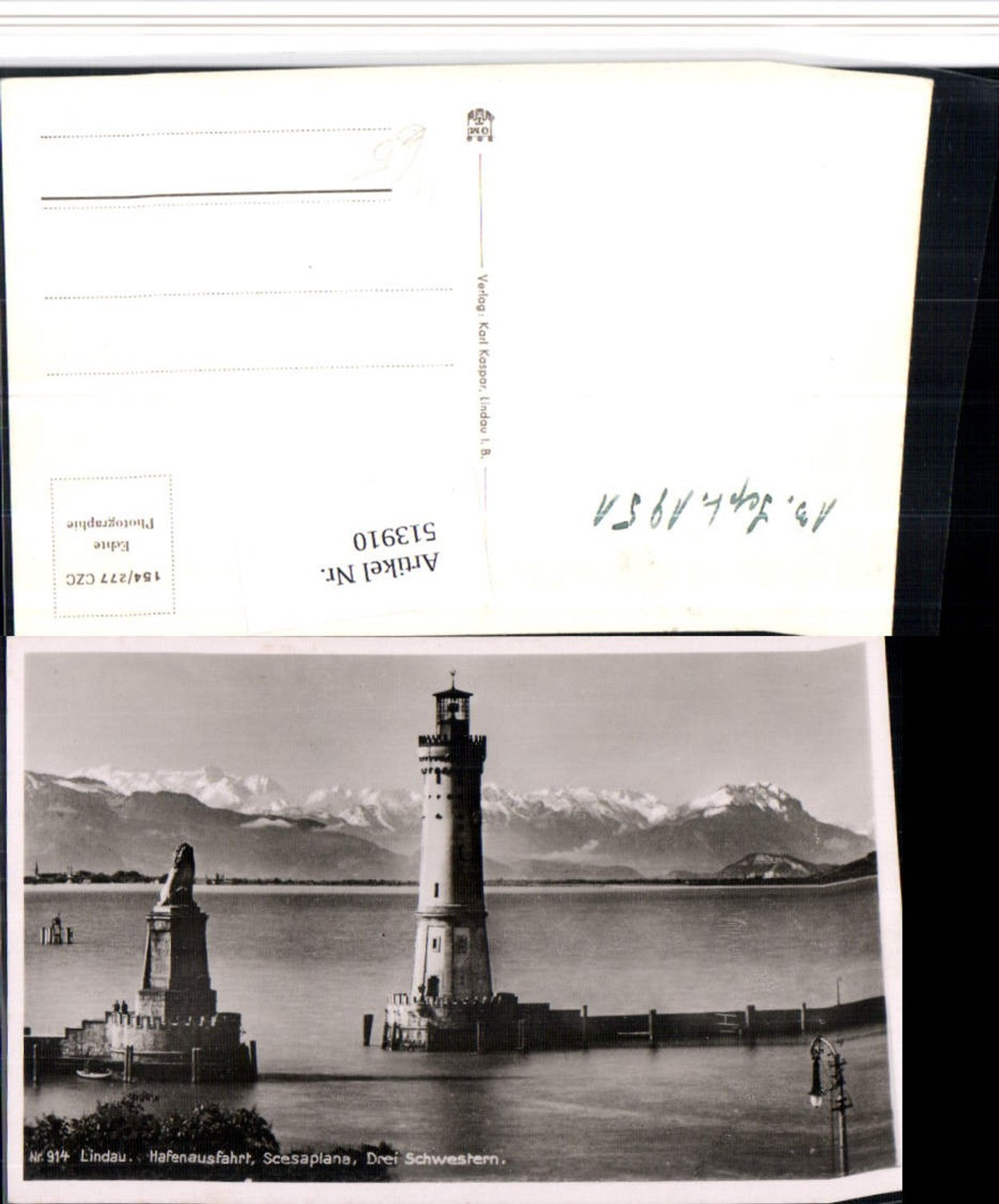 513910,Lindau im Bodensee Hafenausfahrt Leuchtturm Bergkulisse