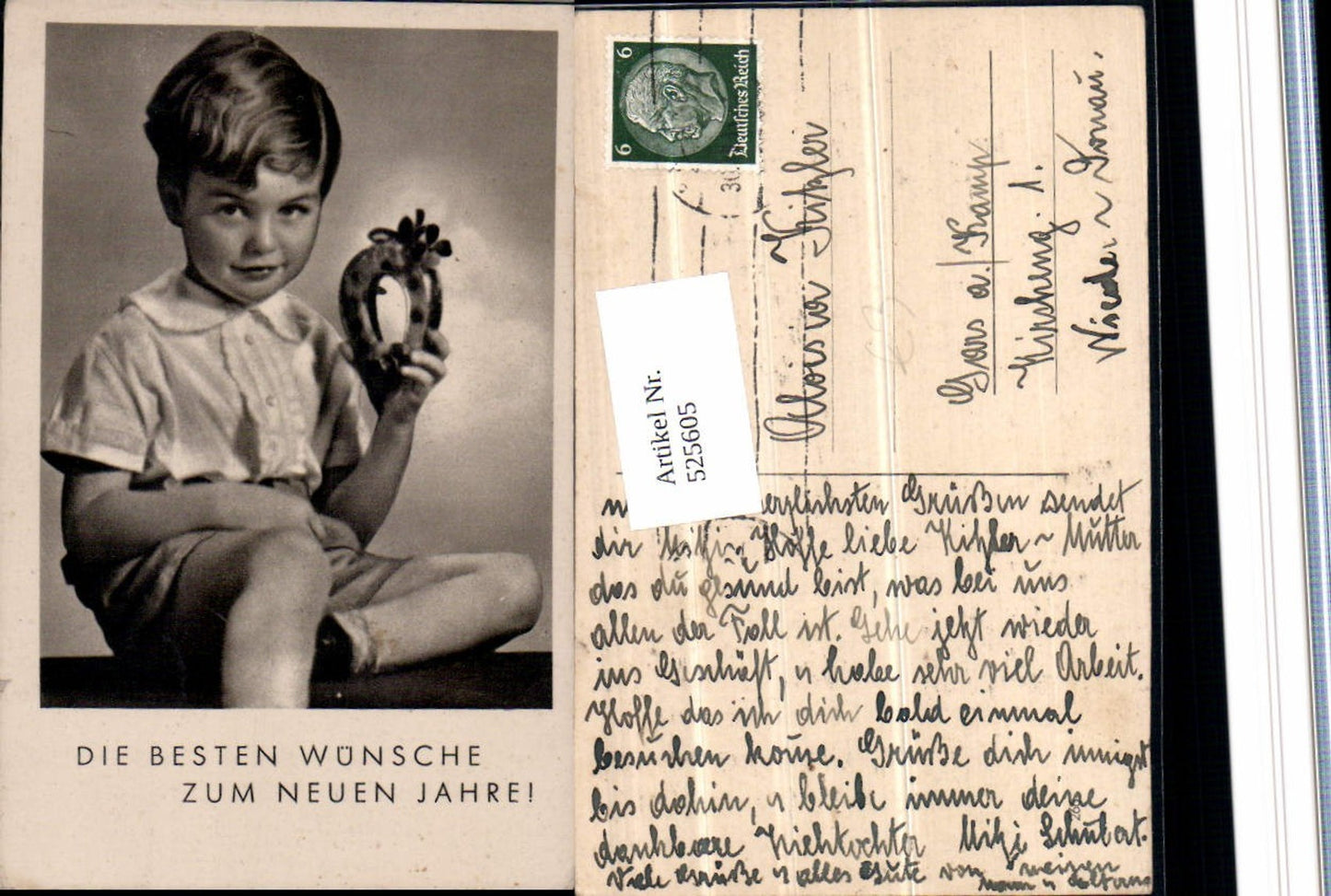 525605,Junge mit Hufeisen Neujahr