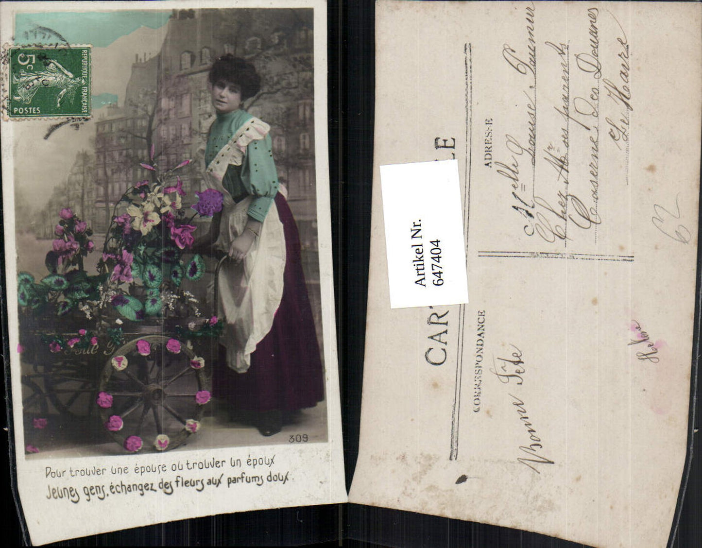 647404,Fotomontage Frau Kleid Schürze Scheibtruhe Schubkarre Text France