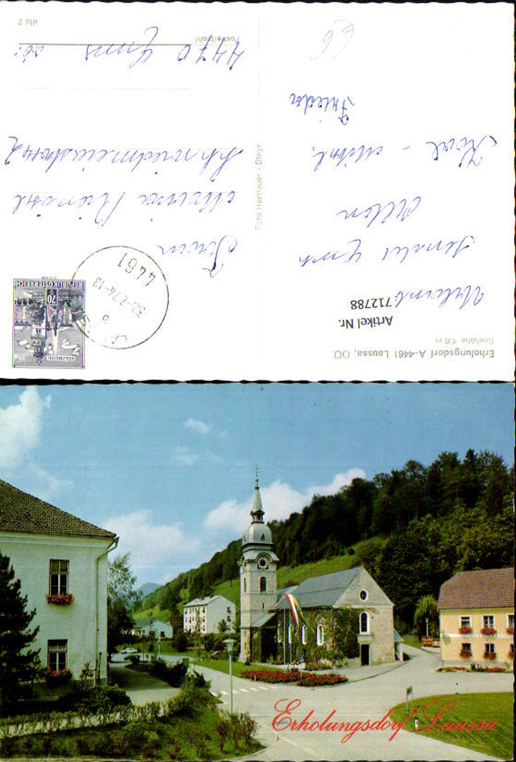 712788 Laussa village scene with church