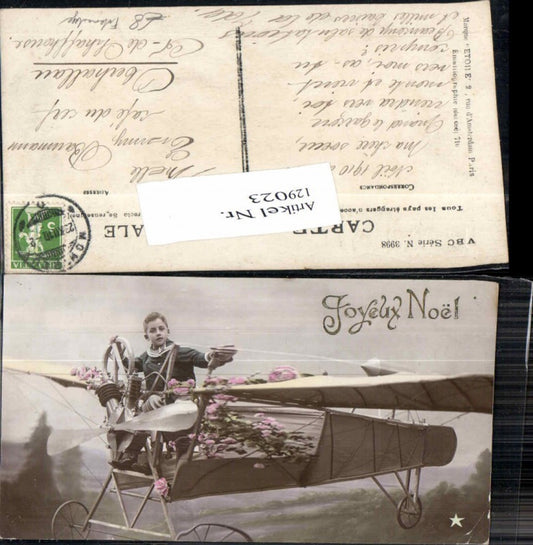 129023,Fotomontage Junge im Flugzeug Flieger Blumen