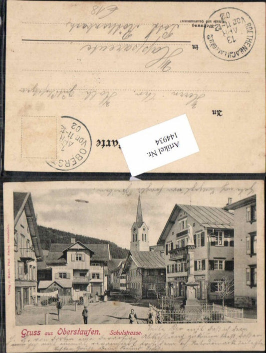 144934,Gruss aus  Schulstrasse Strassenansicht 1900