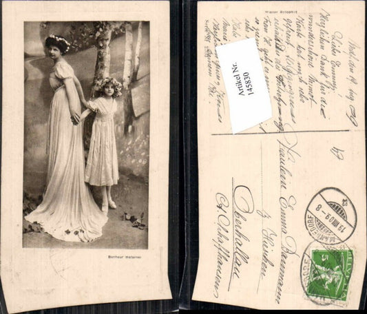 145830,Schöne Frau m. Kleid Mädchen