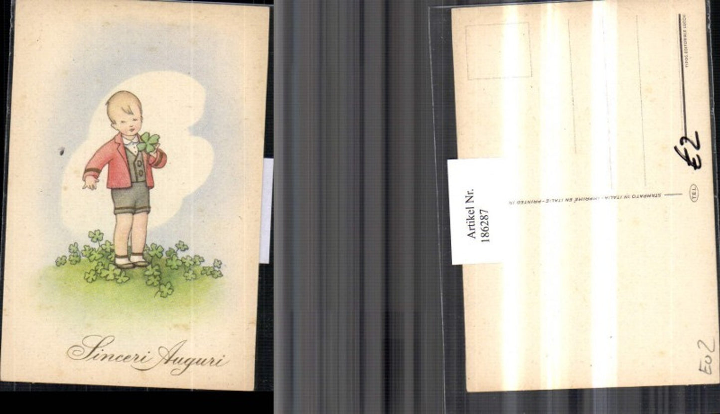 186287,Junge m. Kleeblätter Klee Wiese