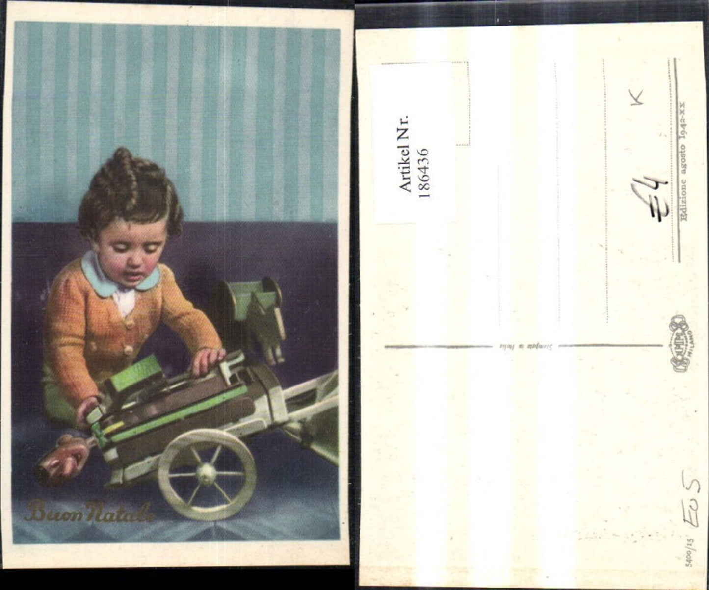 186436, Child boy with toy Buon Natale