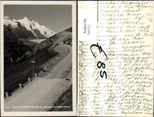 194723,Foto Ak Großglockner Hochalpenstrasse m. Großglockner Heiligenblut Strasse Pierlquelle