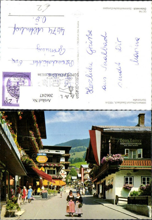 206247,Saalbach Dorfstraße m. Personen Tracht Dirndl Typen Hotel Bauer Haus Rainer