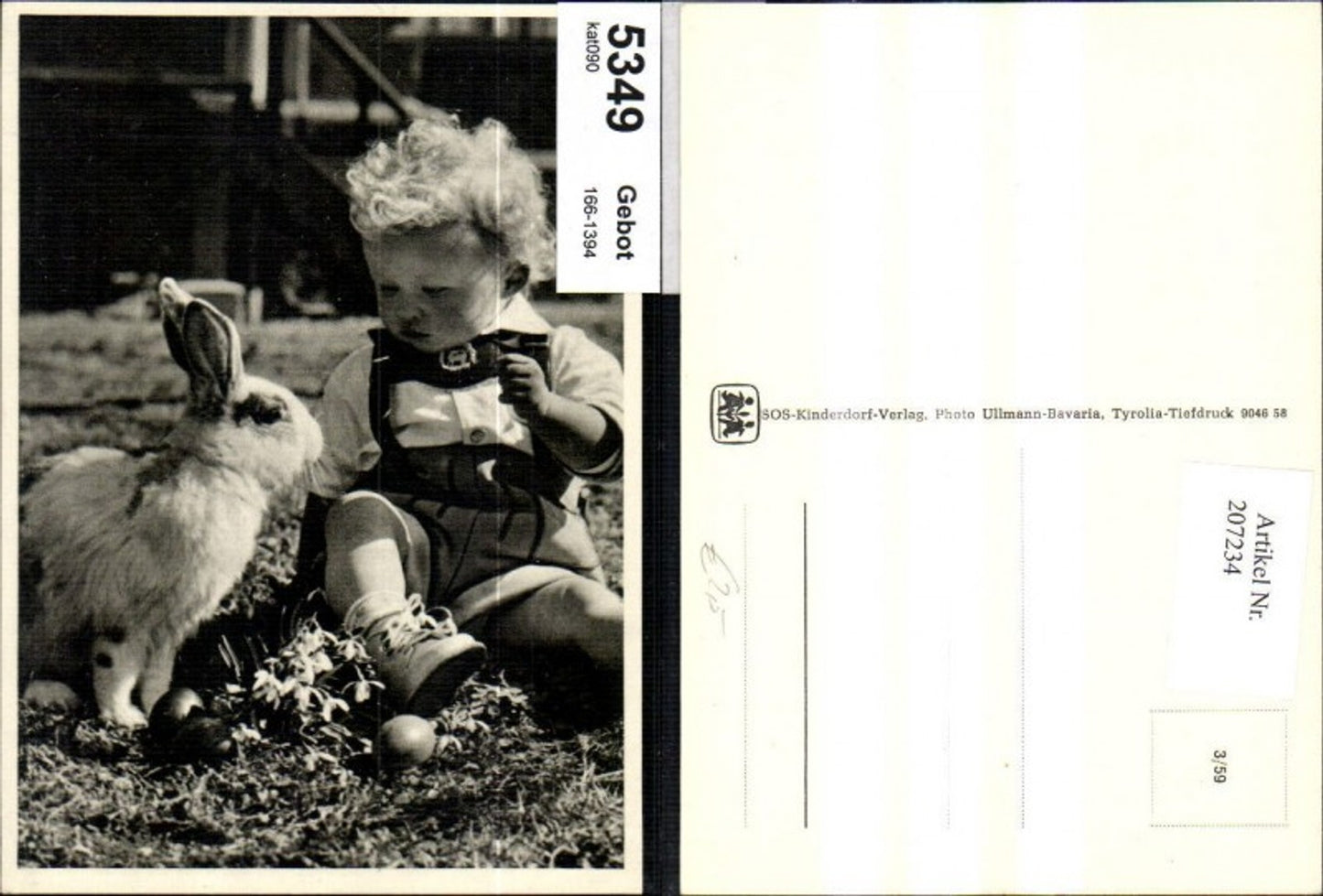 207234, SOS Children's Village 3/59 Child boy sitting with rabbits and Easter eggs in a meadow with snowdrops