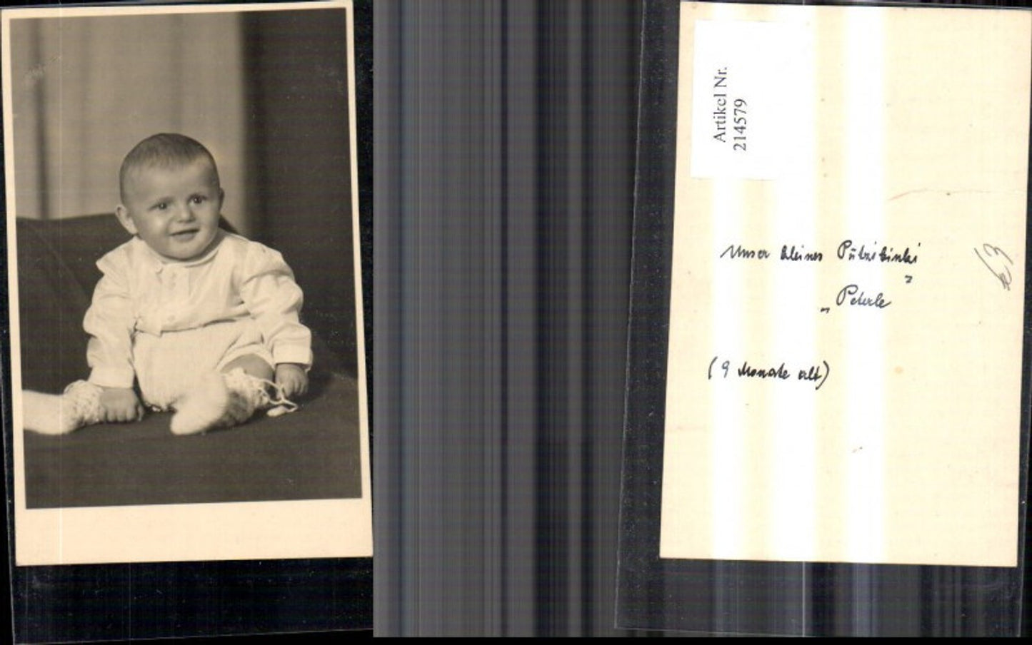 214579,Foto Kind Kleinkind sitzend