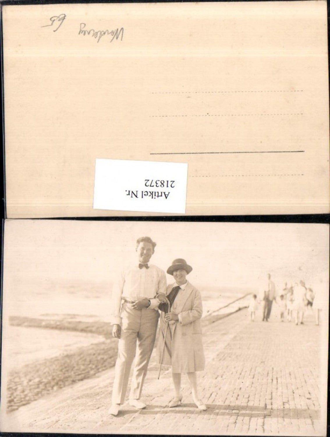 218372,Foto AK Nordseebad Norderney Frau m. Hut u. Stock Mann m. Fliege Promenade