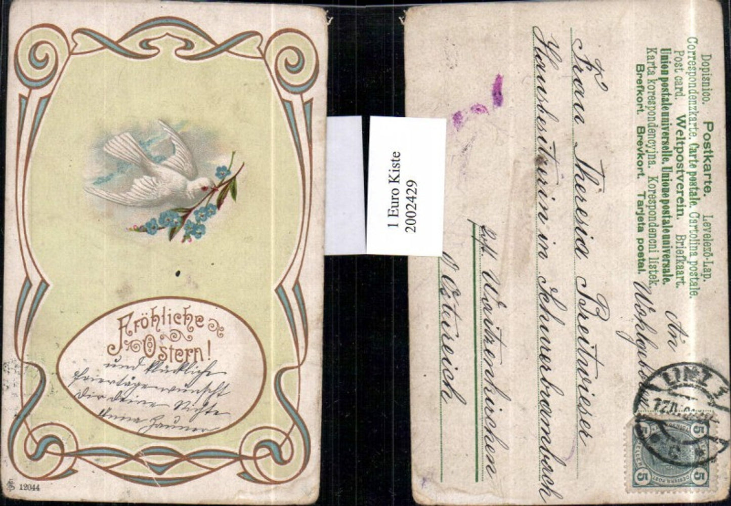 2002429,Ostern Taube b. Blumenzweig Blumen