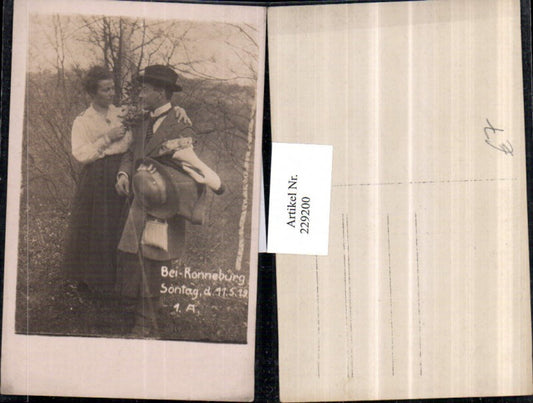 229200, Photo AK Ronneburg Thuringia Loving couple Man with hat Bouquet of flowers 1919