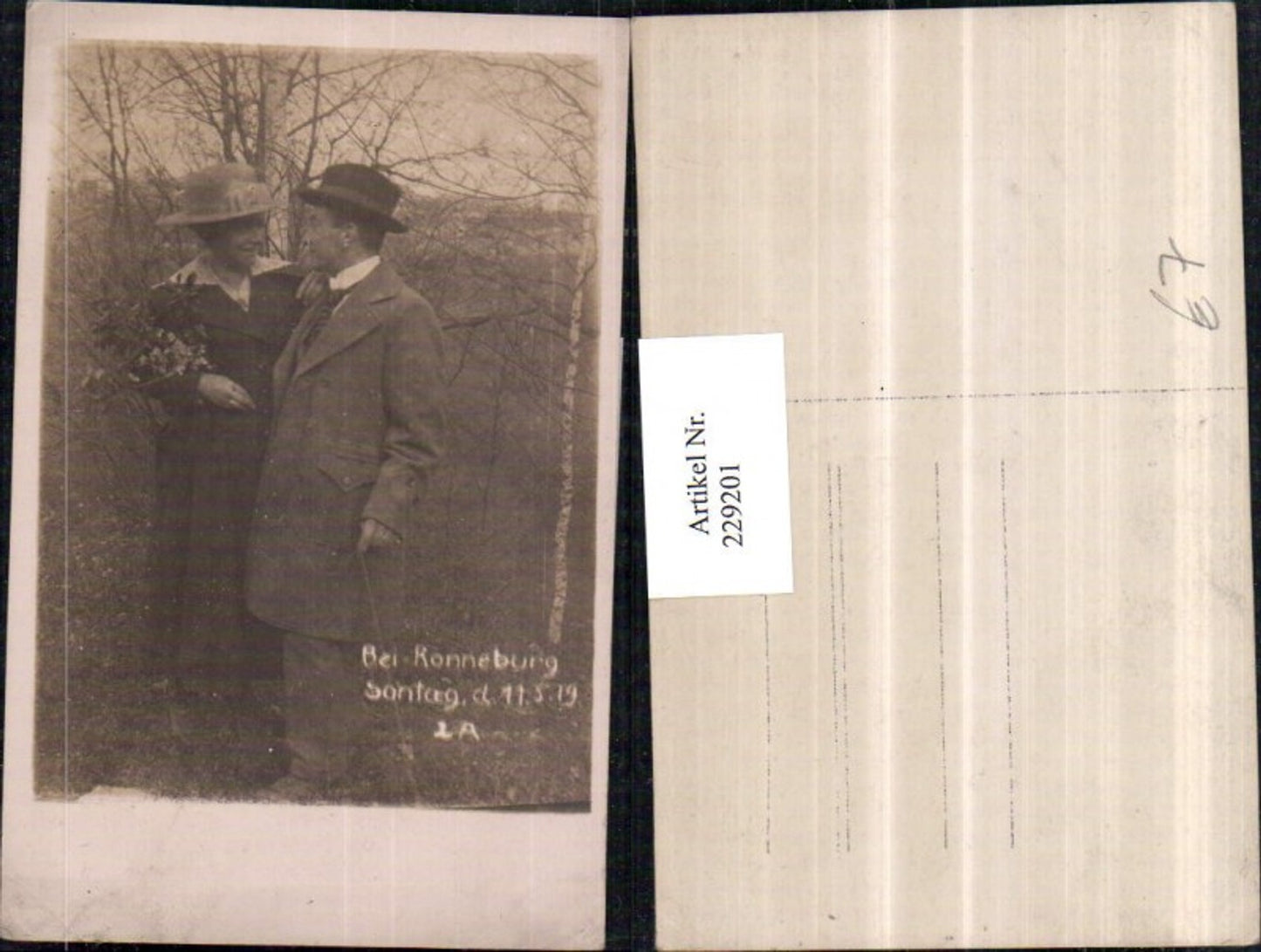229201, Photo AK Ronneburg Thuringia Loving couple Man and woman with hat bouquet of flowers 1919