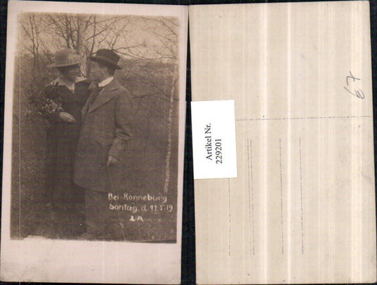 229201, Photo AK Ronneburg Thuringia Loving couple Man and woman with hat bouquet of flowers 1919