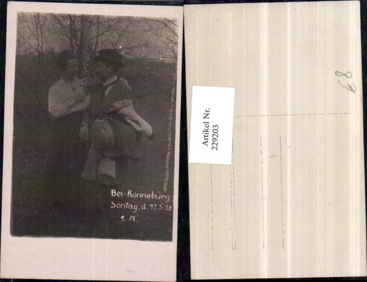 229203, Photo AK Ronneburg Thuringia Loving couple Man with hat Bouquet of flowers 1919