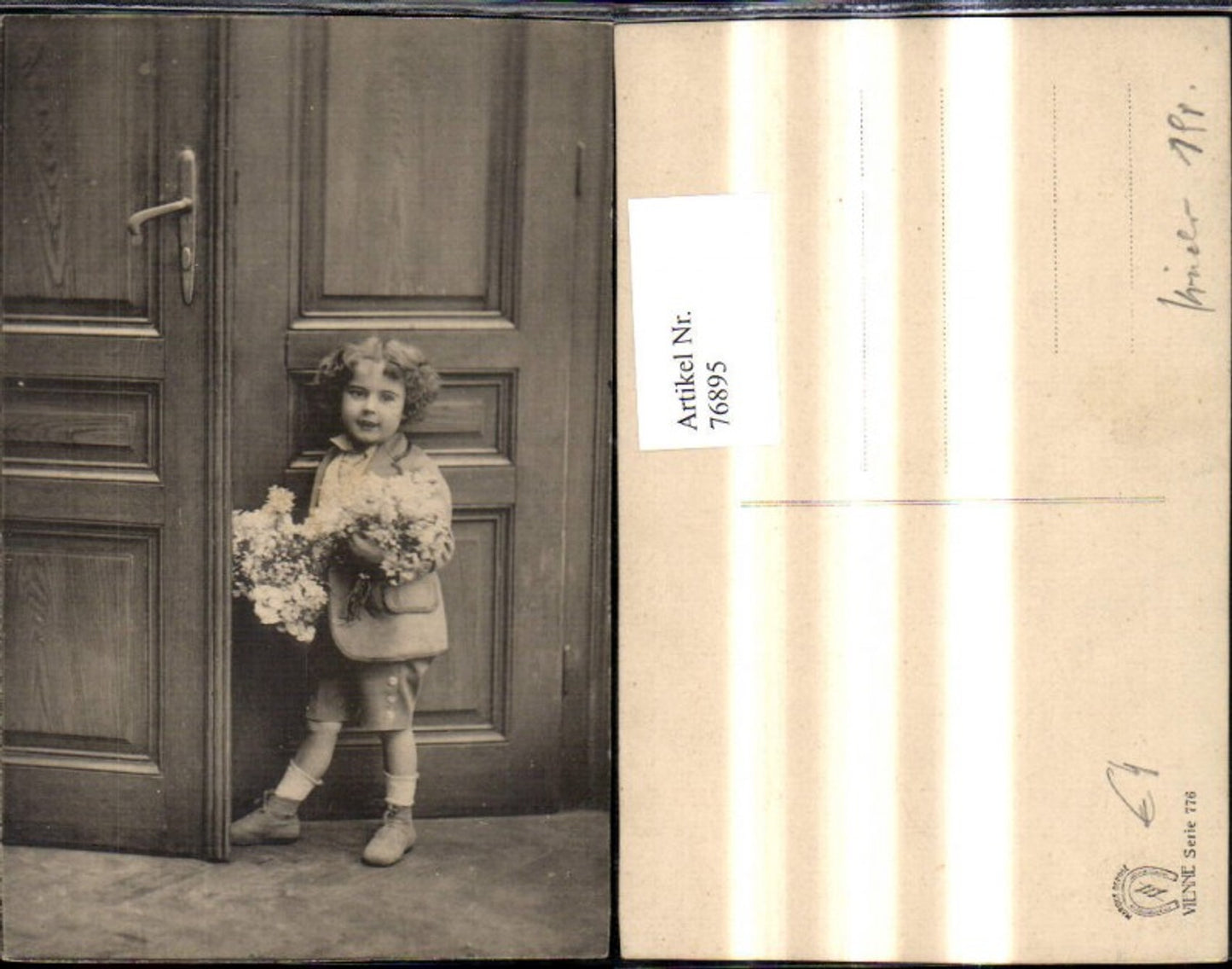 76895, Child girl bouquet of flowers in door