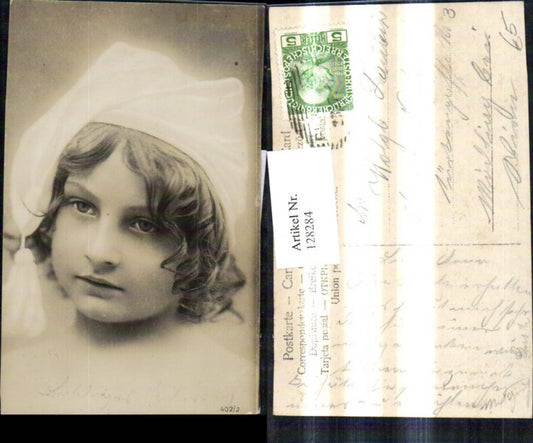 128284,Kind Lockenkopf m. Schlafmütze Portrait