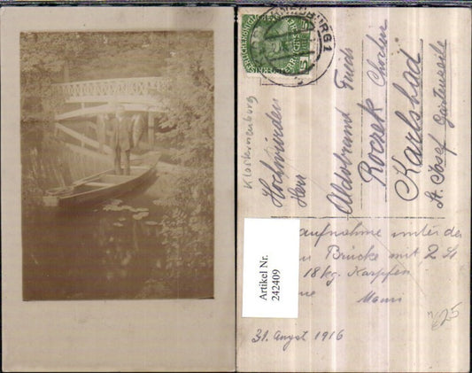 242409,Fotokarte Klosterneuburg Mann m. 2 Karpfen Fische in d. Hand Ruderboot Brücke