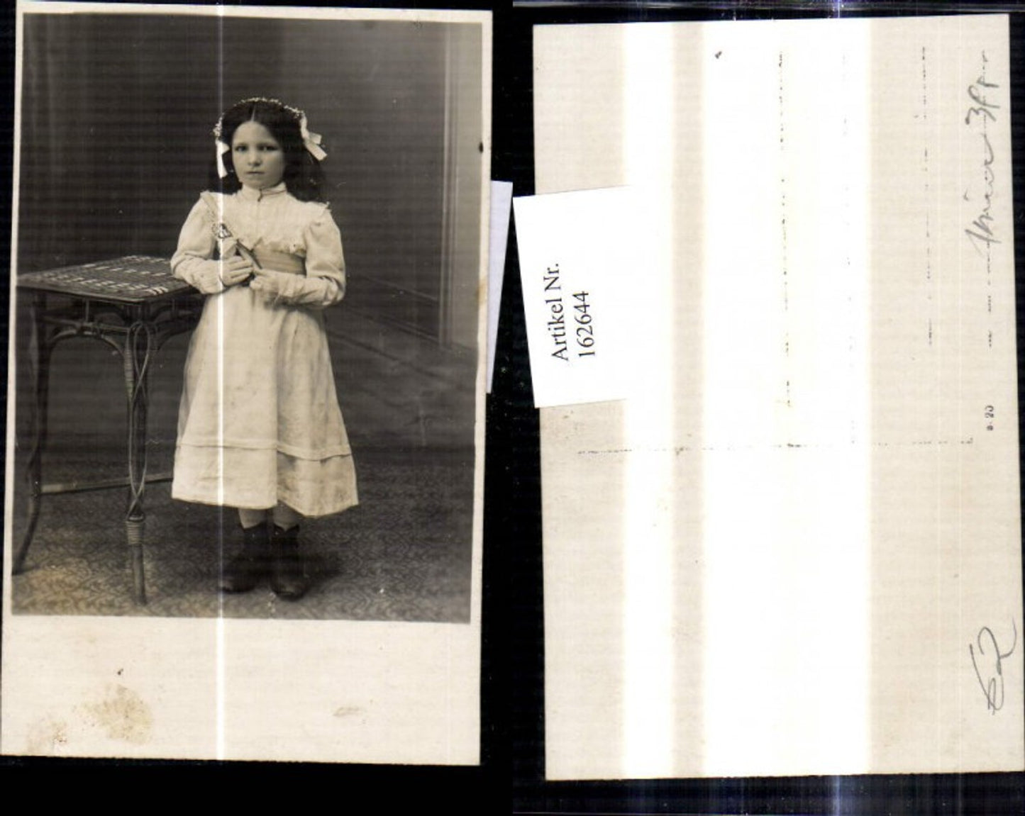 162644,Foto Ak Mädchen Erstkommunion Kerze Kranz i. Haar