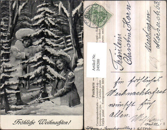 249200, Christmas children girls with hats and coats felling a tree