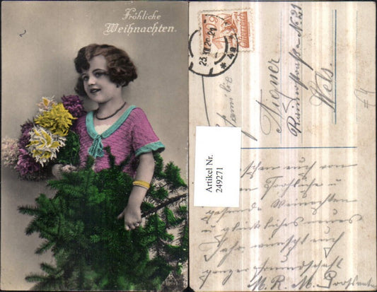 249271, Christmas girl with Christmas tree and bouquet of flowers