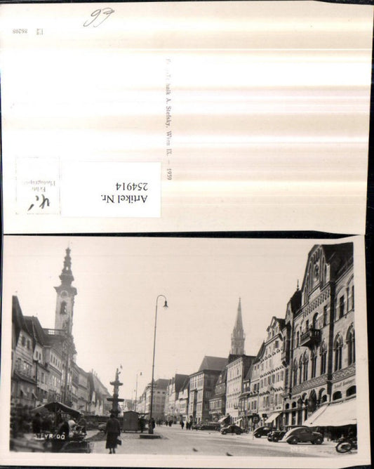 254914,Steyr an d. Enns Hauptplatz Straßenansicht Geschäfte Brunnen Rathaus Kirchenturm