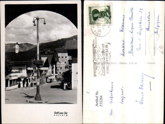 255284,Seltene Foto AK Zell am See Straßenansicht Wegweiser Espresso Cafe Restaurant Geschäfte