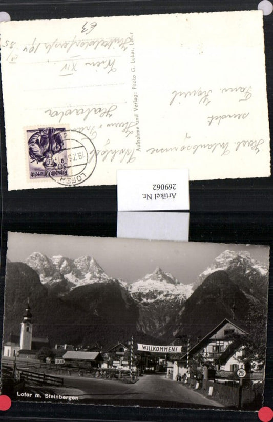 269062,Lofer Teilansicht Kirche Straßenansicht Transparent Willkommen Bergkulisse