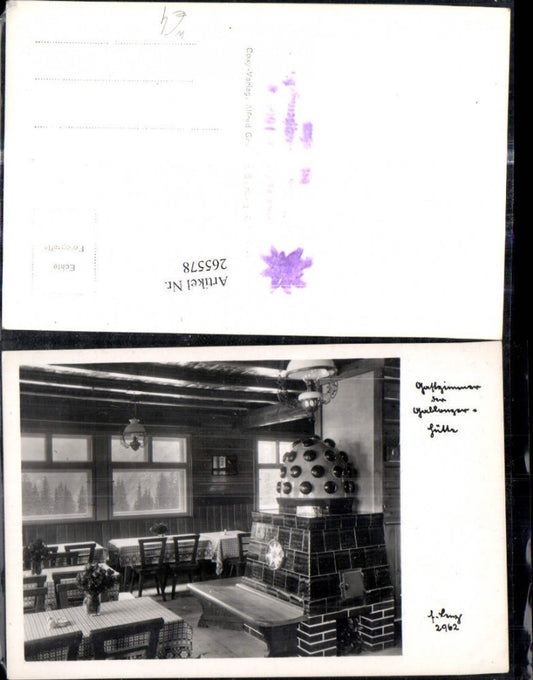 265578,Foto Ak Gastzimmer Gablonzerhütte b. Gosau Kachelofen