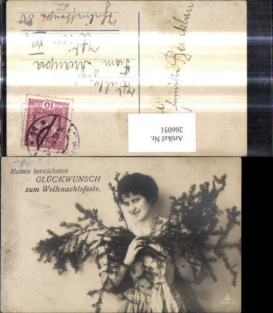 266051, Christmas woman with fir branches