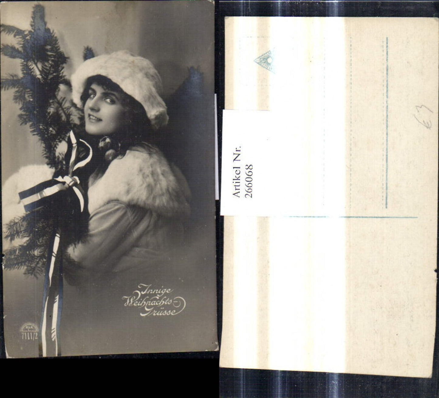 266068, Christmas Woman with fir branch, bow, patriotic fur hat, fur stole, muff
