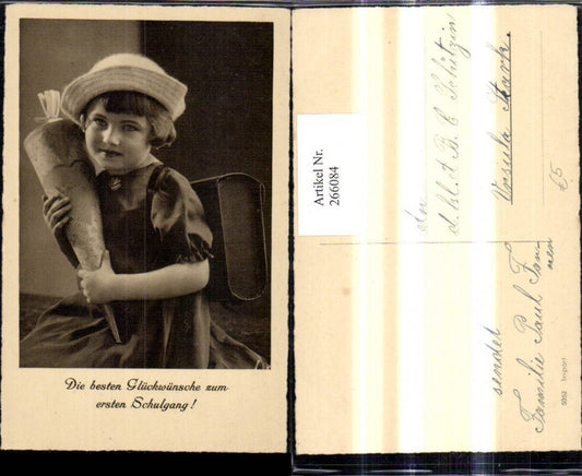 266084, First day of school, enrollment of a girl with school cone, hat, and school bag