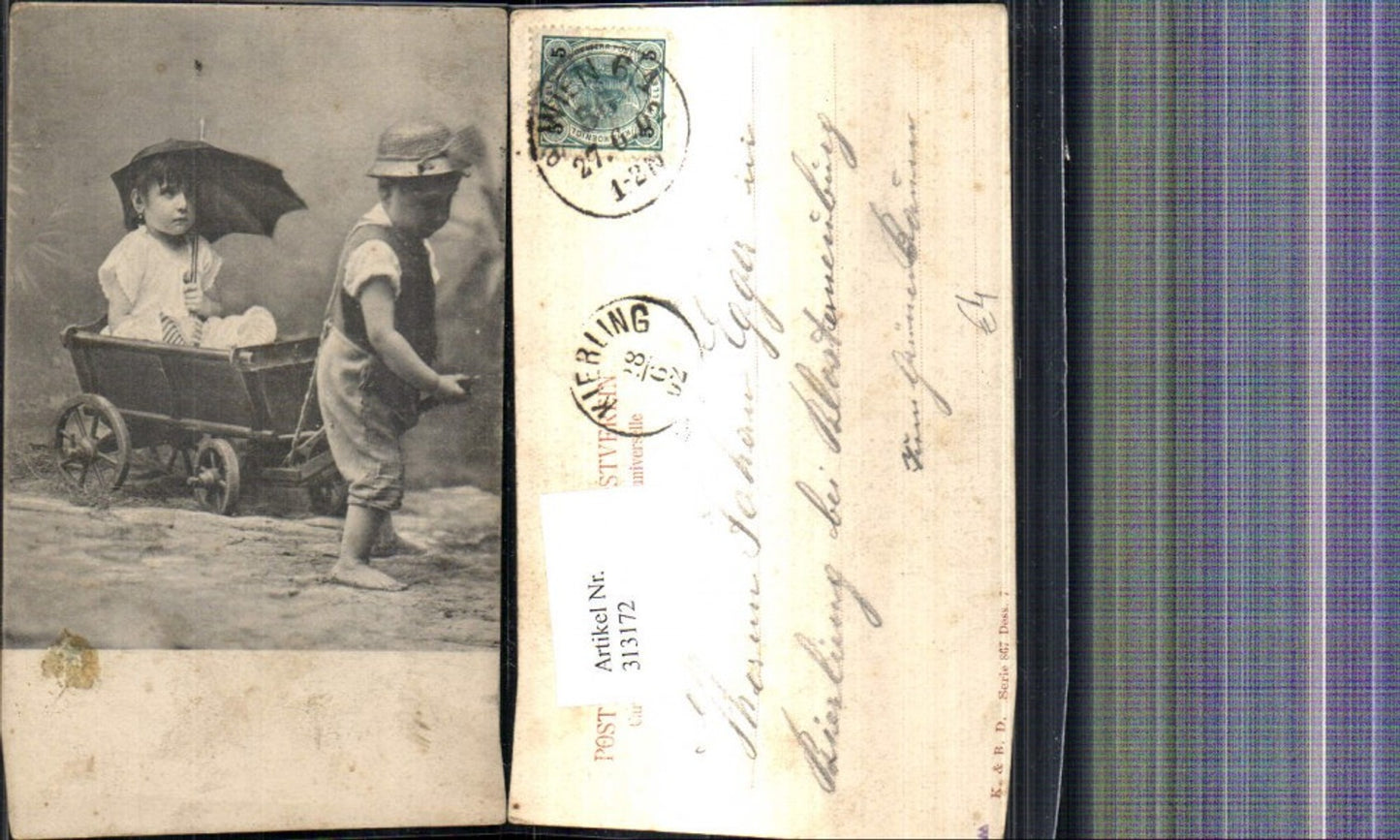313172,Kinder m. Leiterwagen Schirm