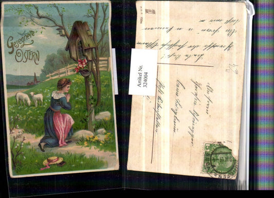 324004,Künstler AK Ostern Frau b. Beten Gebet Andacht Schafe Lämmer