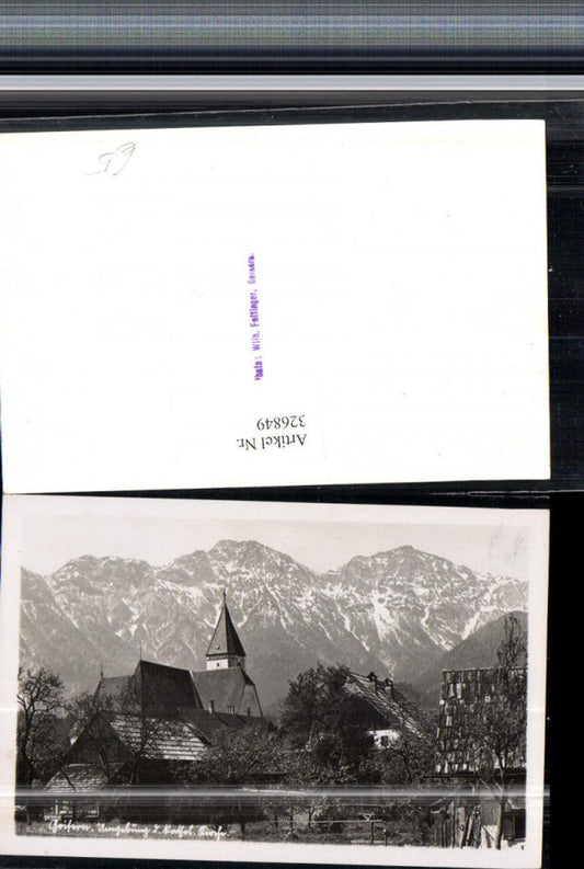 326849,Bad Goisern Katholische Kirche Bergkulisse