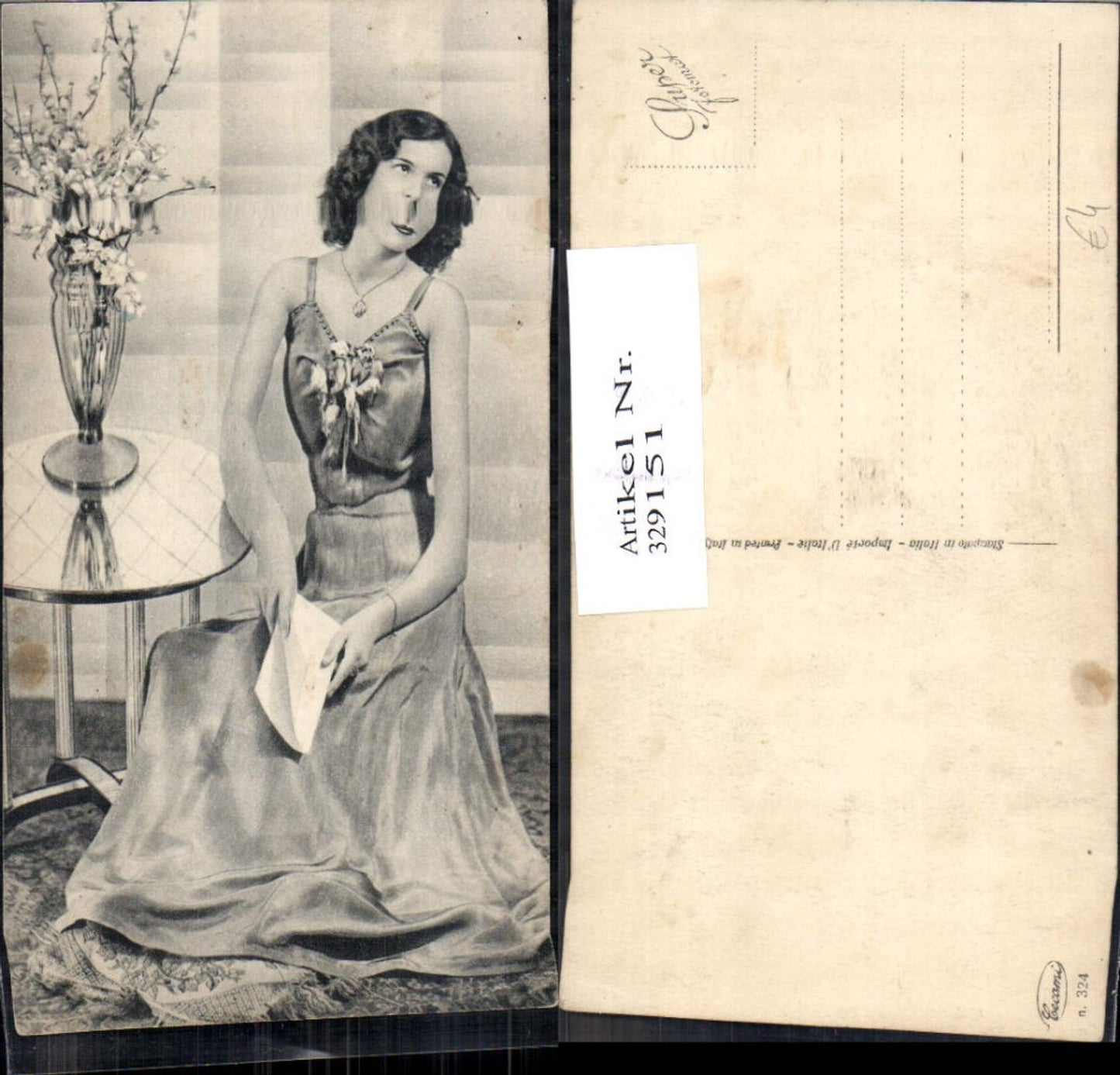 329151, Reading woman letter flower vase