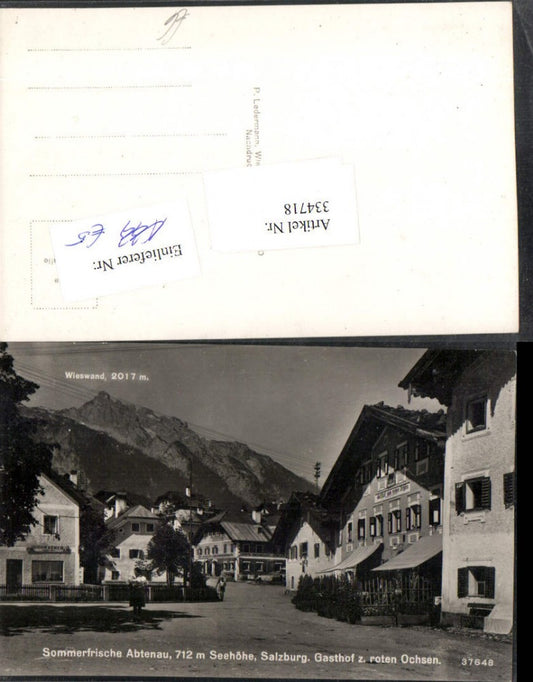 334718,Abtenau Straßenansicht Gasthof zum roten Ochsen Bergkulisse